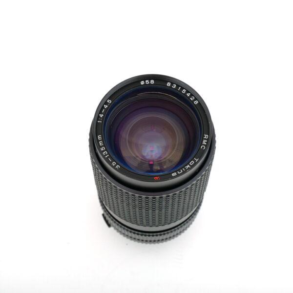Tokina MF 35-135mm/4-4,5 für Olympus OM (leichter Staub im Linsensystem, kein Einfluss auf Bildqualität) – Bild 3