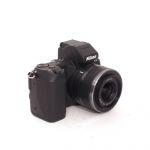 Nikon 1 V2 Gehäuse (1825 Auslösungen) + 1 Nikkor 10-30mm/3,5-5,6 VR schwarz, OVP, Bereitschaftstasche
