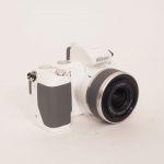 Nikon 1 V2 Gehäuse (669 Auslösungen) + 1 Nikkor 10-30mm/3,5-5,6 VR weiß, OVP, Bereitschaftstasche