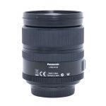 Panasonic Lumix D Vario Elmar 14-150mm/3,5-5,6 ASPH, (kleines Härchen im Linsensystem, kein Einfluss auf Bildqualität), Sonnenblende, für Four Thirds