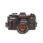 Fujica AX Multi Program Gehäuse, Riemen + MF 50mm/1,9