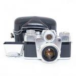 Zeiss Ikon Contarex “Bullseye”, inkl. Planar 50mm/2 Sonnenblende, Tasche