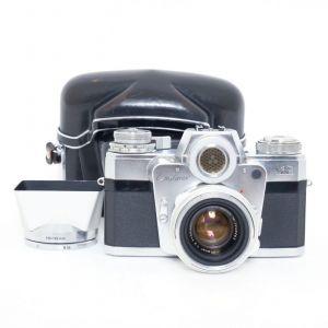 Zeiss Ikon Contarex “Bullseye”, inkl. Planar 50mm/2 Sonnenblende, Tasche