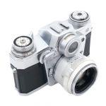 Zeiss Ikon Contarex “Bullseye”, inkl. Planar 50mm/2 Sonnenblende, Tasche